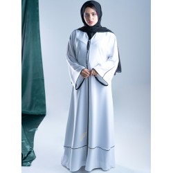 AM4004 Formal white abaya with black embroidery slit on the bottom corner the headcover not included