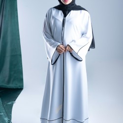 AM4004 Formal white abaya with black embroidery slit on the bottom corner the headcover not included