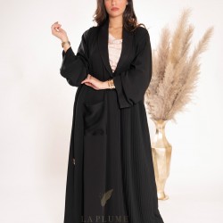 AS1013 Abaya with a unique modern design in crepe fabric with one pocket and pleats on the other side with a collar neck and two large buttons fastening in the middle