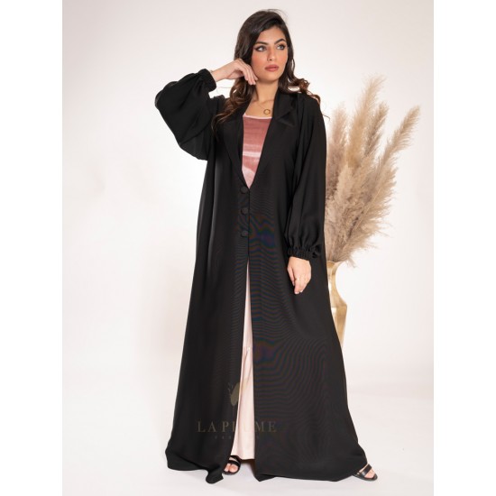 AS1014 An elegant practical abaya with black crepe fabric and a collar neck with three large buttons in the middle and zip sleeves