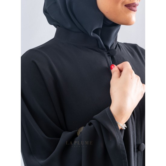  AS1018 A formal royal black crepe abaya with a mandarin neck and a closure with large buttons fitted with side pockets the headcover not included