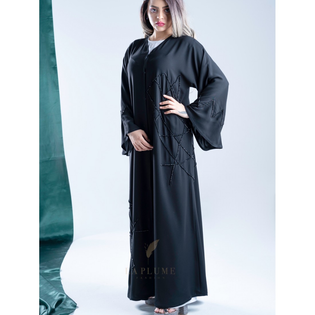 AK3004 A hand work black abaya with a stylish design on the sides and ...