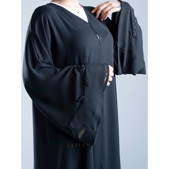 AK3010 A hand work floral style abaya dangling on the sides, black color, and a light touch on the French sleeve, double chiffon fabric
