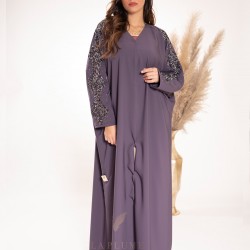 AK3018 A sophisticated butterfly design with a modern touch, hand work on the sleeves, with a colorful abaya, a v-neck, a narrow sleeve, and a locking button on the front