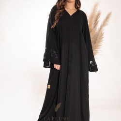 AK3020 Double chiffon abaya with a v-neck. There are flower branches from bottom to top in the middle behind the abaya and on the French sleeves