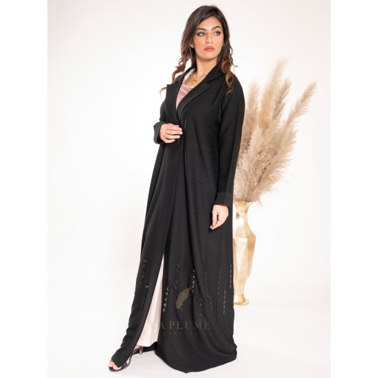 AK3025 Open abaya with wrap lock, characterized by its patterned fabric and comfortable touch, with a dress neck and narrow sleeves, wrapping a hand work, in black squares at the bottom