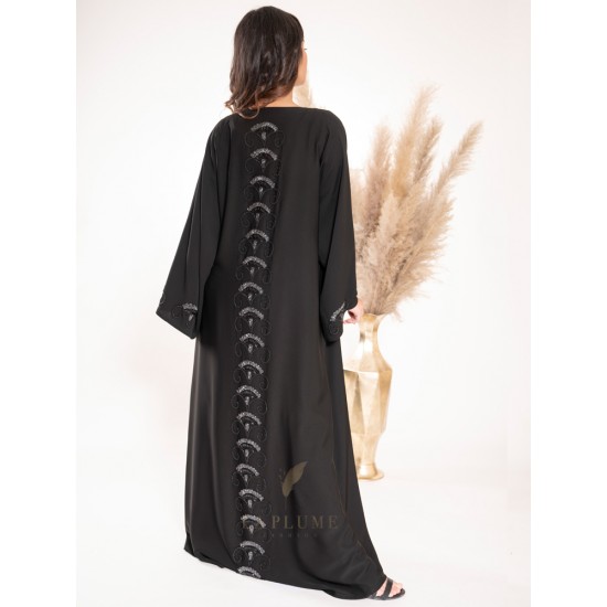 AK3028 Black crepe abaya with a v neck hand work from bottom to top in the middle behind the abaya and on the sleeves