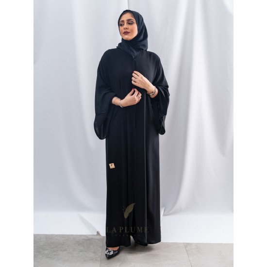 AK3038 Royal black crepe abaya mixed with five chiffon pieces at the bottom with an elegant design and hand work on the pieces. Beautiful assortment and also with a small chiffon piece on the French sleeves the headcover not included