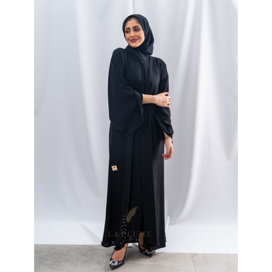 AK3038 Royal black crepe abaya mixed with five chiffon pieces at the bottom with an elegant design and hand work on the pieces. Beautiful assortment and also with a small chiffon piece on the French sleeves the headcover not included